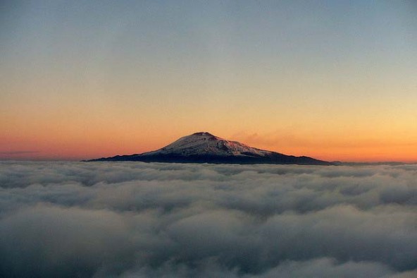 Mount Etna among clouds